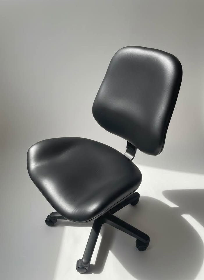 ErgoGenesis black office chair — angled full-chair source view
