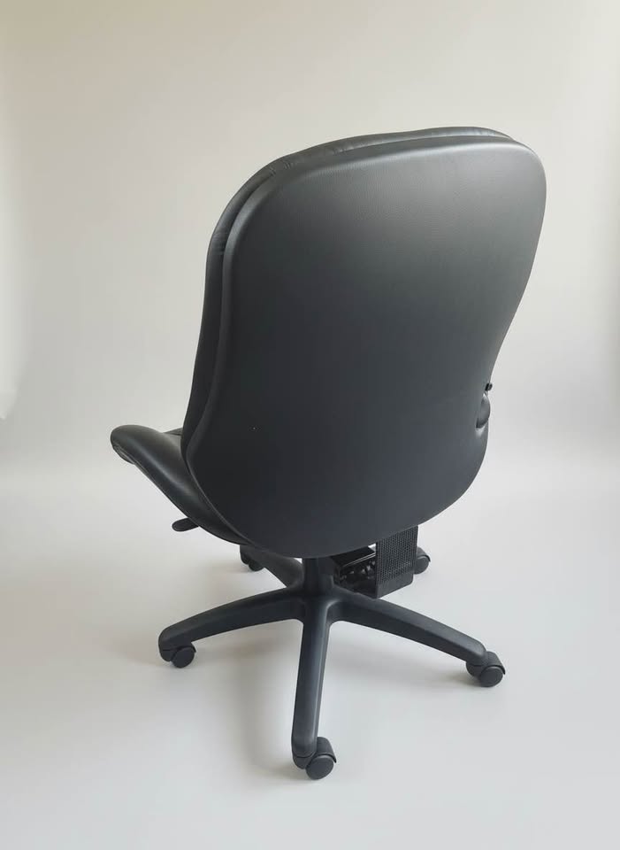 ErgoGenesis black office chair — rear and rolling-base source view
