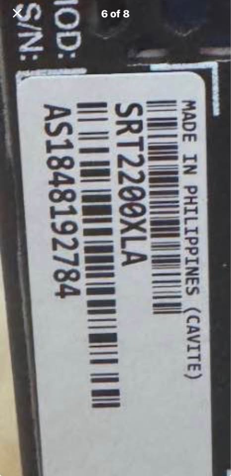 Original close view of the APC SRT2200XLA model and serial label