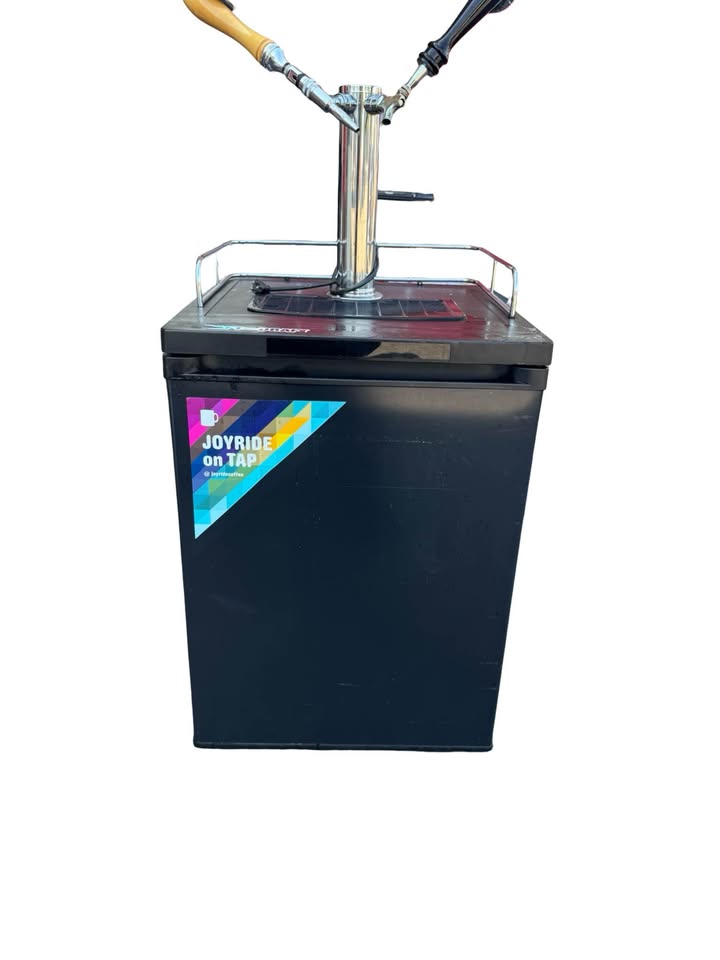 Actual Kegco MDK-209B-01 black cabinet with pictured dual-tap tower and visible cosmetic wear