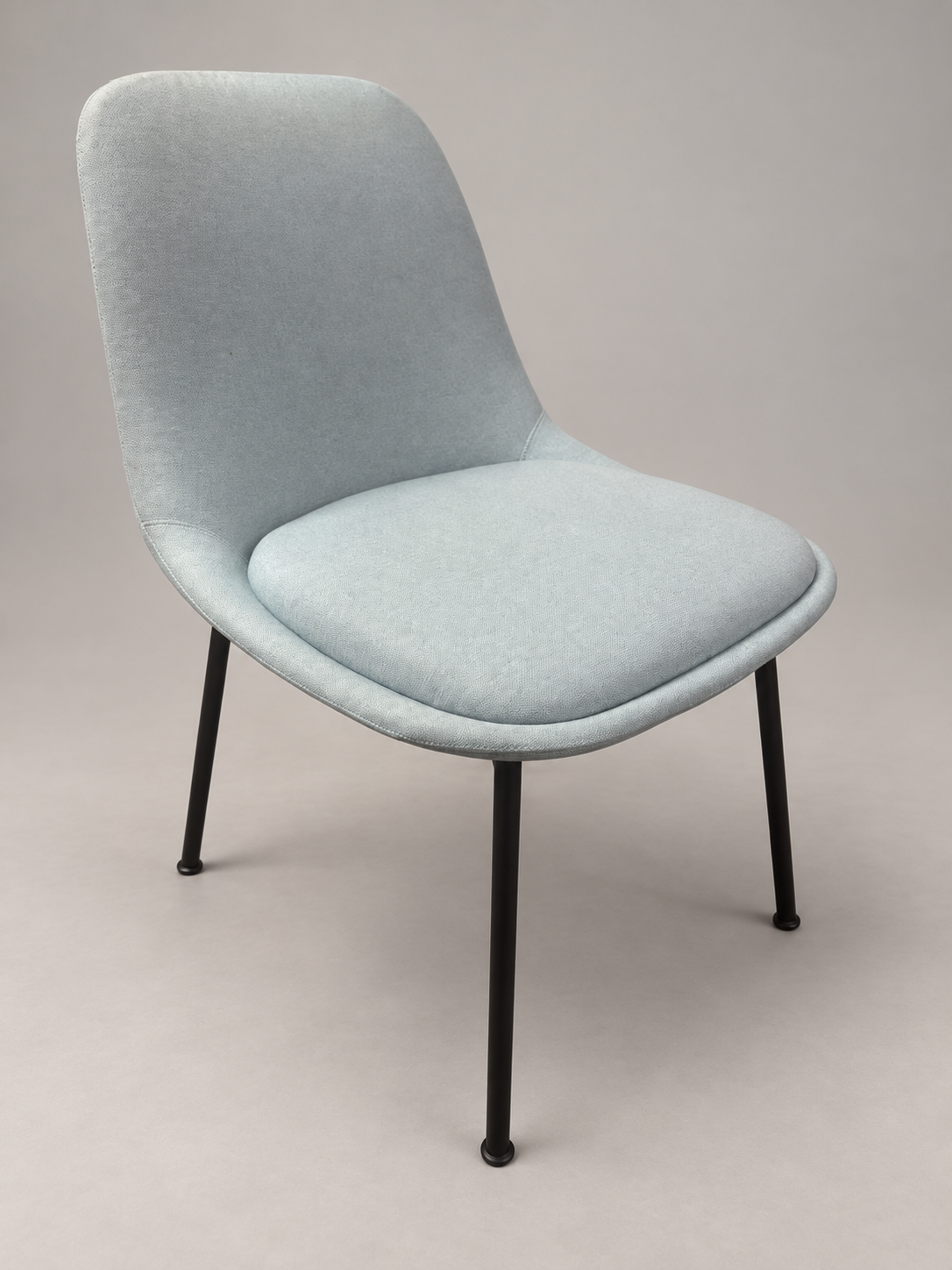 Bernhardt chair front-left view; digitally staged background