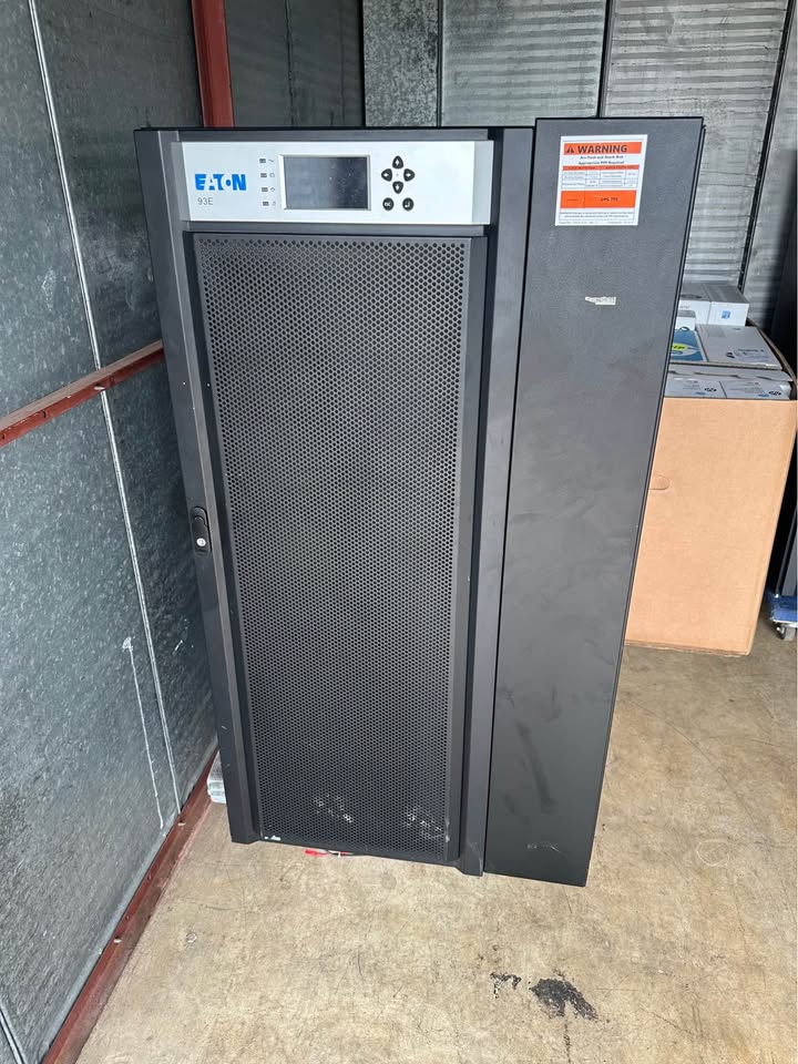 Eaton 93E UPS and integrated accessory cabinet front view