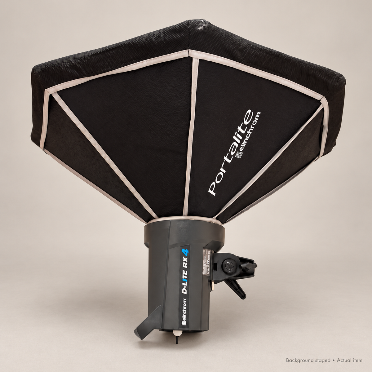 Actual Elinchrom flash and Portalite softbox side view; background staged