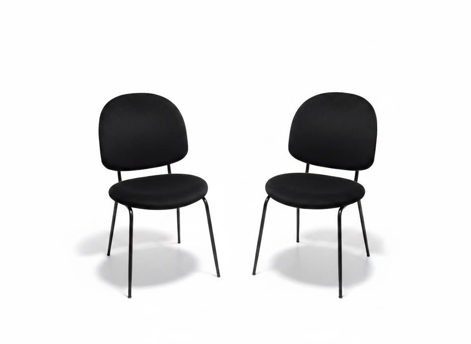 Source photograph showing both matching black upholstered Stellar Works chairs