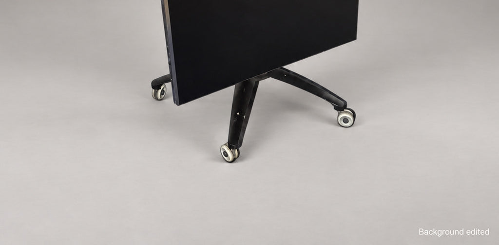 Exact-item rolling display stand and caster detail for Samsung QN82Q6FNAFXZA; staged background edited, visible wear retained.