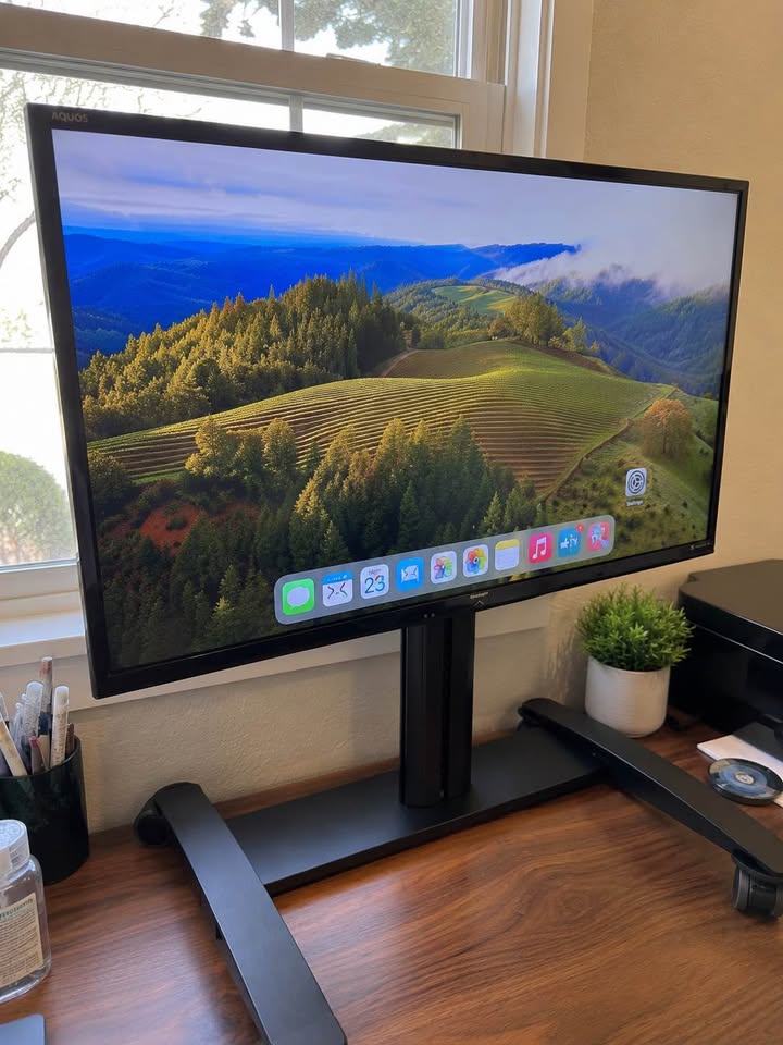 Sharp LC-50LE650U on rolling cart — archived powered-screen view