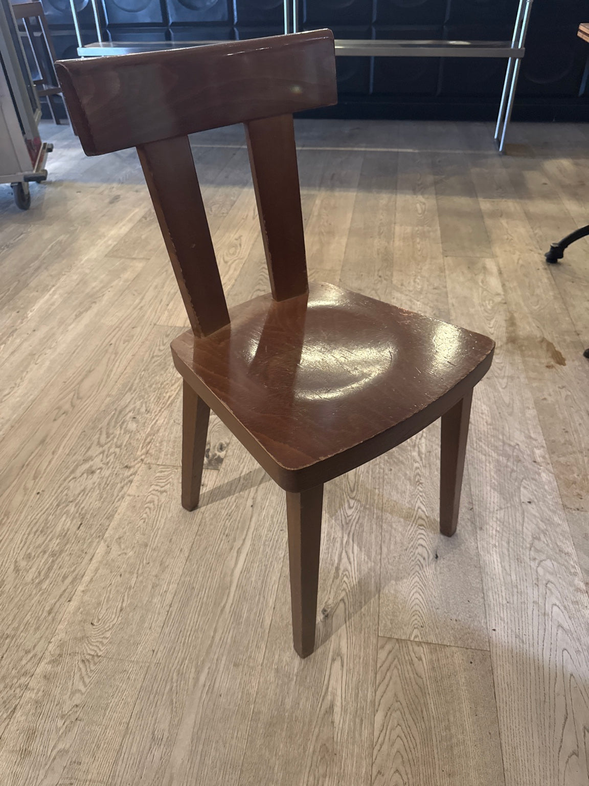 Original chair front photograph showing seat and edge finish wear.