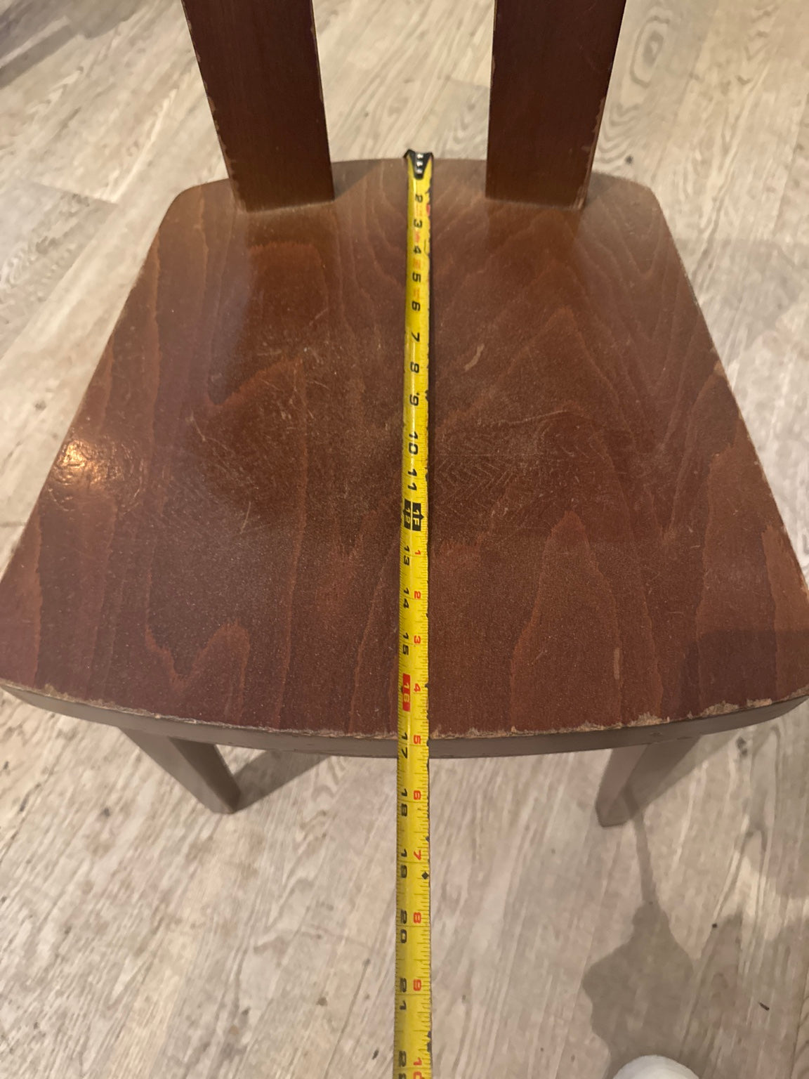 Original chair seat-depth tape photo; read actual tape and confirm selected chair.