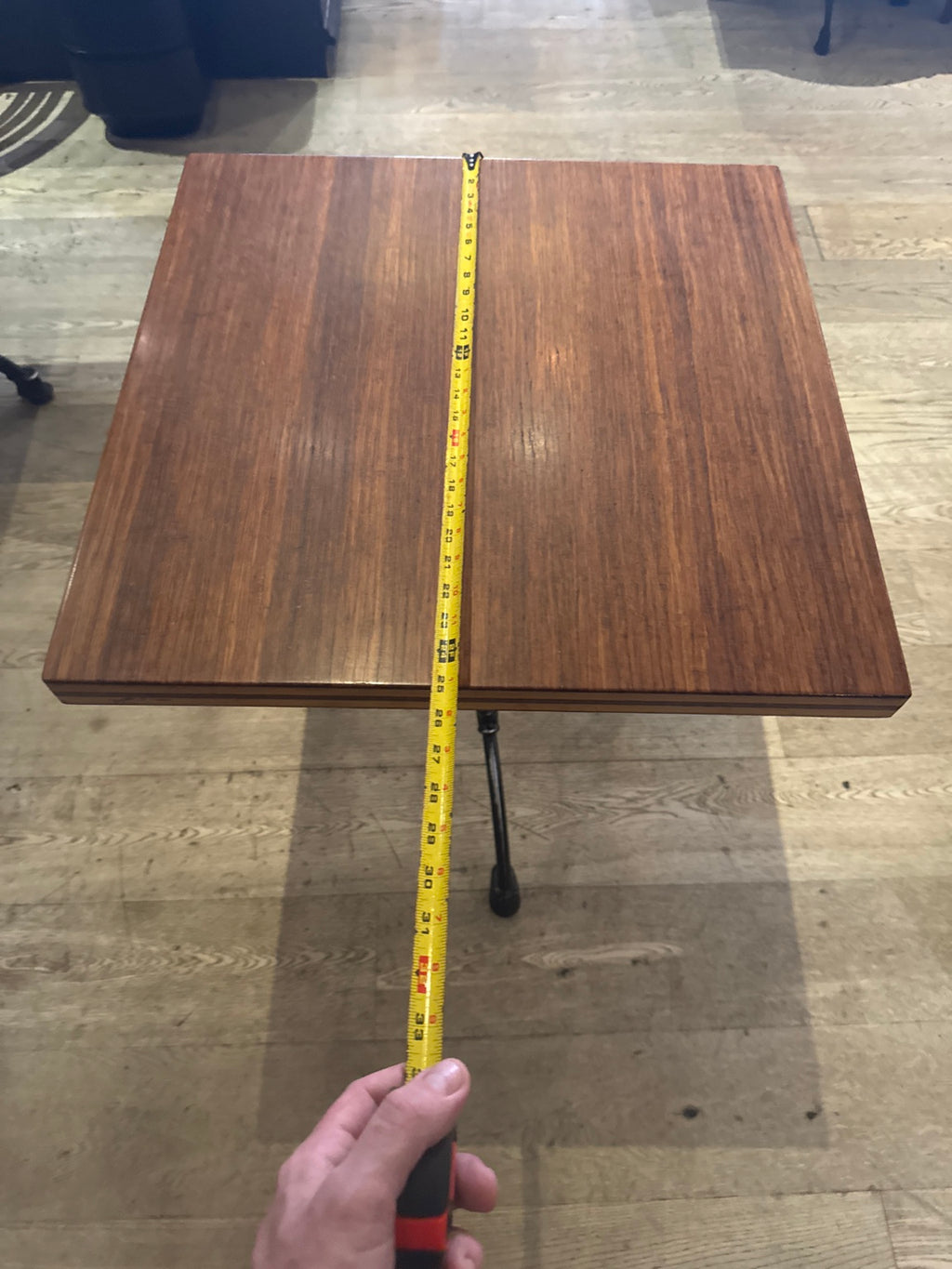 Original tabletop tape-measure photo along the other side; final depth requires confirmation.