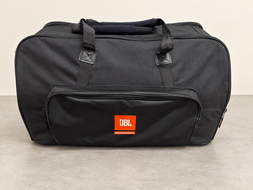 Actual JBL Professional protective bag with visible wear preserved on a clean staged neutral background.