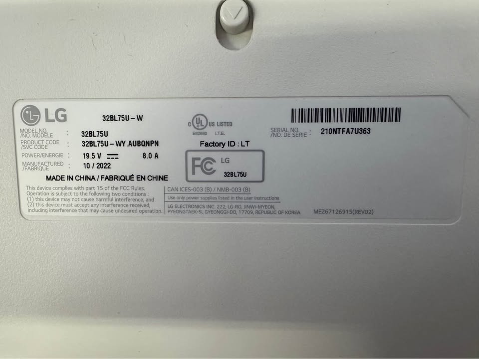 Original LG 32BL75U-W model and serial label; unchanged identity evidence.