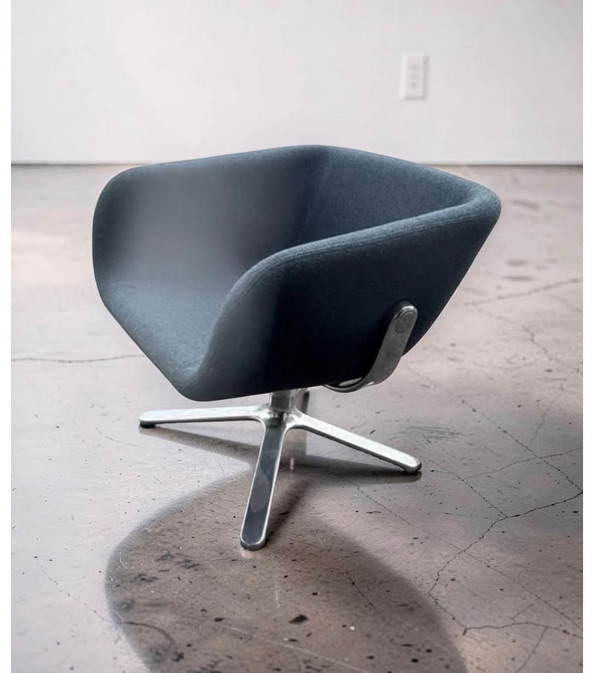 Supplied historical angled view of Hightower upholstered chair and metal base.