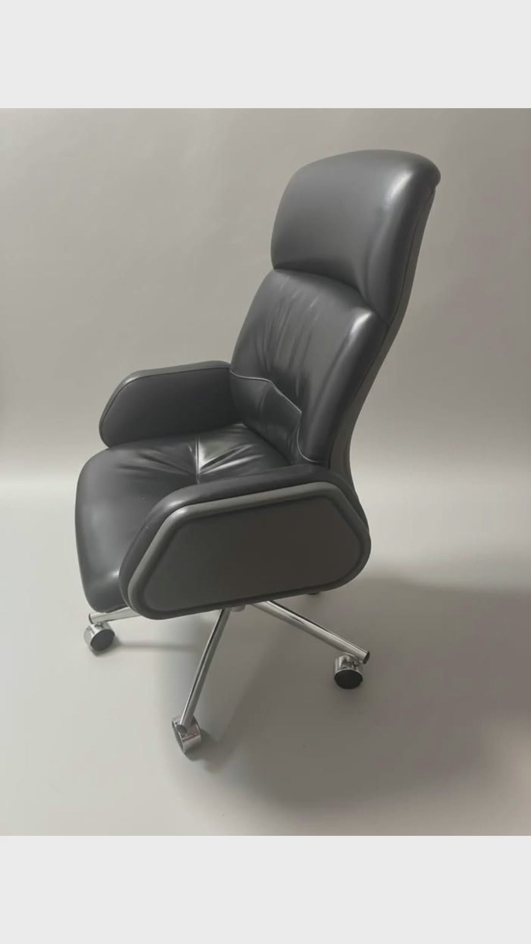 Black high-back office chair with visible cracked and peeling arm upholstery; 28-second product overview
